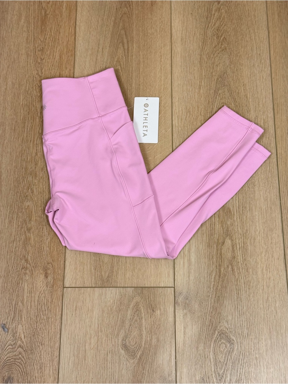 NWT Athleta Salutation Stash 7/8 Leggings Size Medium Waterlilly Pink